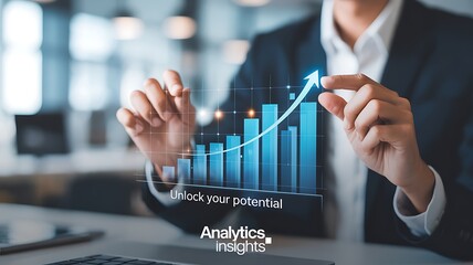 Businessman's hand points toward a rising financial graph demonstrating growth and business success in a modern workspace environment.
