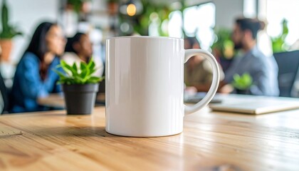 White coffee mug mockup on a wooden table in a modern office. In the blurred background, a diverse group of colleagues is having a business meeting. The scene evokes collaboration and coffee breaks.