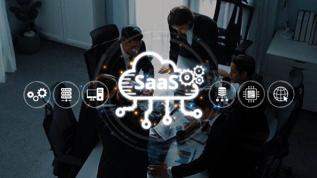 A group of professionals collaborates in a modern office setting, focusing on SaaS concepts while utilizing digital tools and icons to enhance productivity and strategy. Raster - Powered by Adobe