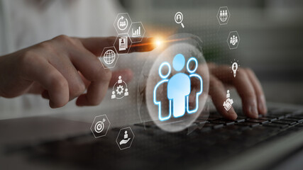 Glowing human figures surrounded by business icons representing HR data analysis, employee management, and recruitment analytics Parse