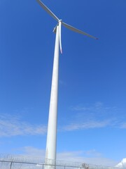 road to heaven, wind turbine against blue sky, road to the sky