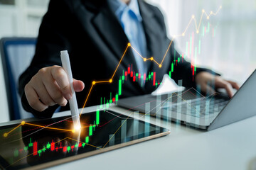A business professional is analyzing stock market trends using a tablet in a modern workspace, with a digital graph overlay indicating market growth and investment strategies. Scalp