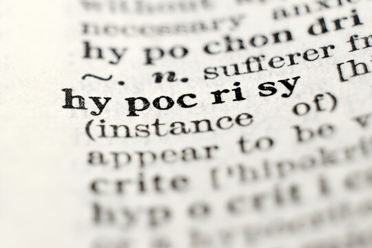 Hypocrisy definition in dictionary, macro close-up