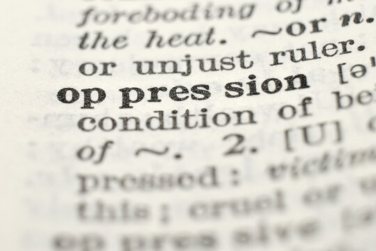 Oppression definition in vintage dictionary, macro close-up