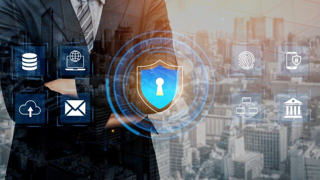 Businessman Overlooking Cityscape with Digital Security Icons and Shield Symbolizing Data Protection and Cybersecurity in Modern Technology Landscape Gluon. - Powered by Adobe