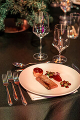 Gourmet Christmas appetizer served at festive dinner
