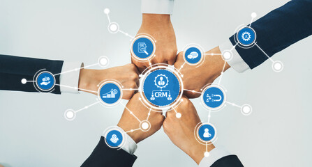 A dynamic visual depicting diverse hands coming together in a collaborative manner, highlighting the importance of technology and connection in business success through CRM. Amity