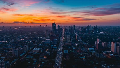 Obraz premium City Skyline During Sunset in a Large Urban Area With High Buildings and Busy Streets