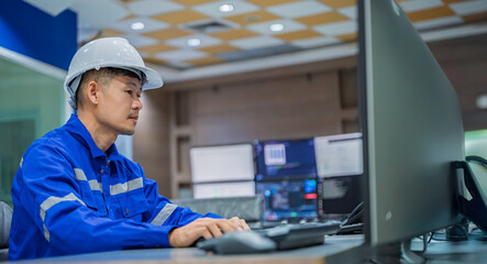 Engineer working at control room, Manager control system, Technician man monitoring program from a lot of monitor.Specialist observes analytics dashboard,operator inspects digital interface