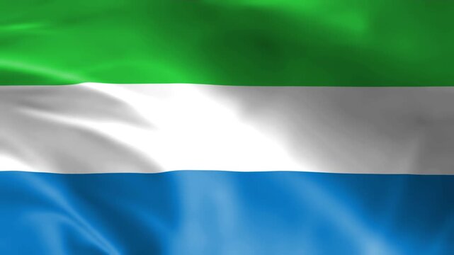 Waving flag of Sierra Leone national symbol with green white and blue stripes fabric texture for patriotic or travel themes