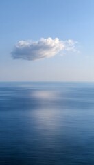 Obraz premium Serene ocean vista a tranquil minimalist backdrop reflecting soft sunlight across calm waters