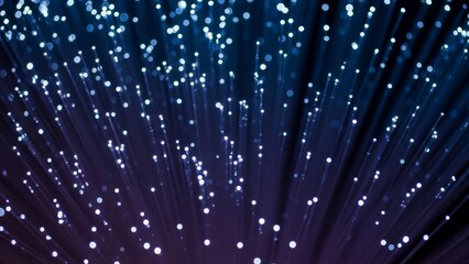Fiber optic cables glowing blue, data network connection