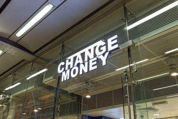Illuminated Change Money Sign