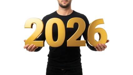 A man holding large gold numbers representing the year 2026 on transparent background