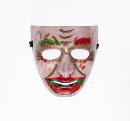Strange aggressive theatrical carnival mask isolated on white background