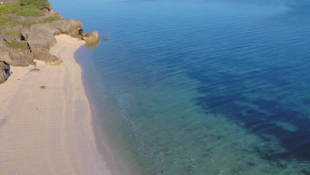 Aerial view of sandy tropical beach and shallow water, Philippines