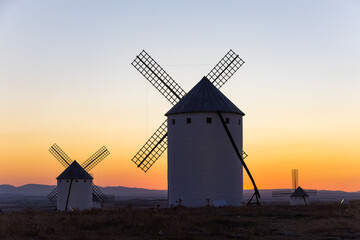 Campo de Criptana windmills silhouette at sunset in La Mancha