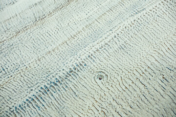 Repeating pattern in the sand along an Atlantic beach.
