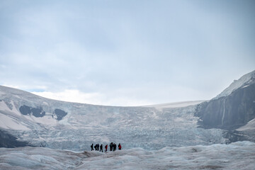 View into the Athabasca Glacier in Jasper National Park with cloudy sky