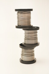 Coils with solder. Plastic coils with tin-lead solder. Materials for electronics repair.