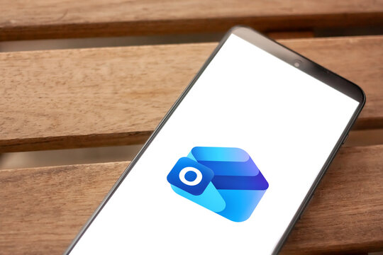 Microsoft Outlook logo shown on an Android smartphone screen, representing a platform for email, calendar management, and workplace productivity.
