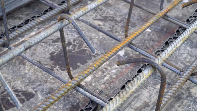 Close-up capture showcases steel rebars for slab reinforcement.