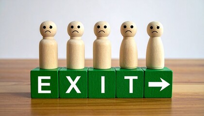 Row of Sad Wooden Peg People Standing on Green Blocks Spelling EXIT with Directional Arrow on a Wooden Surface