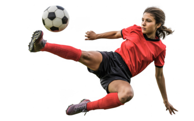 Dynamic female soccer player striking a powerful shot mid-air during a competitive match