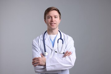 Fototapeta premium Portrait of medical assistant on grey background