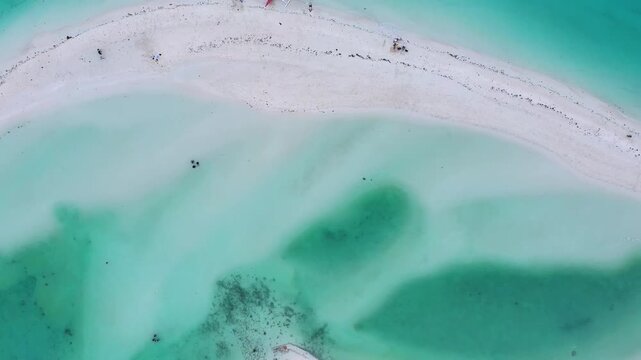 Top-down aerial view of shallow sandbar and turquoise sea, Philippines