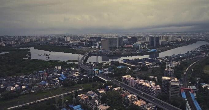 Aerial view of Bandra Kurla Complex (BKC), Mumbai, India, showcasing the city&rsquo;s prominent financial and commercial district. Beautiful cloudy weather during the monsoon.