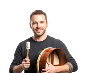 Smiling man holding a traditional Irish bodhrán drum and a tipper stick, enthusiastically ready to play folk music and celebrate culture.