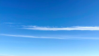 Azure backdrop with streaky wisps of white against a gradient. Some texture, from light to dark