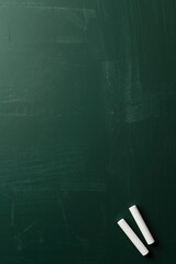A versatile dark green chalkboard surface, subtly textured with faint chalk residue, provides a classic background. Two clean white chalk sticks rest diagonally in the bottom right corner, symbolizing