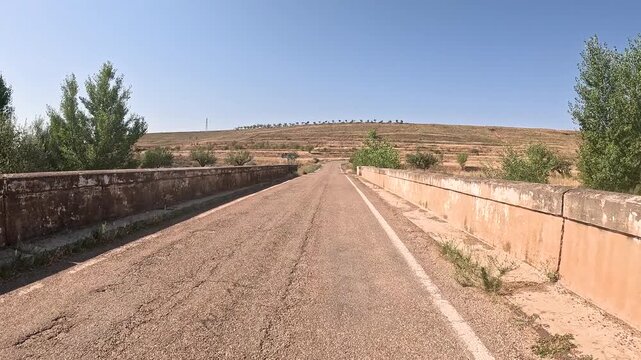 A-2504 paved road - bridge over Ribota river near Cervera de la Canada, province of Zaragoza, Aragon, Spain