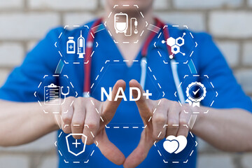 Doctor using virtual touch screen presses the text NAD+. NAD+ intravenous or syringe injection of...