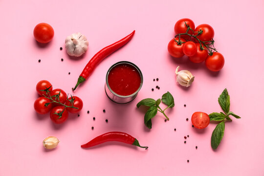 Tin can of tasty tomato paste and different ingredients on pink background - Powered by Adobe