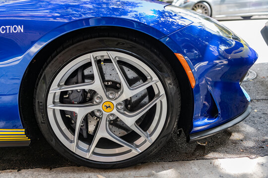 Miami, Florida, USA - February 16, 2025: Car Ferrari 812 Competizione parked outdoor. Blue sportscar, wheel view. Ferrari 812 Competizione sport car with tuning. Sportscar Ferrari 812 Competizione.