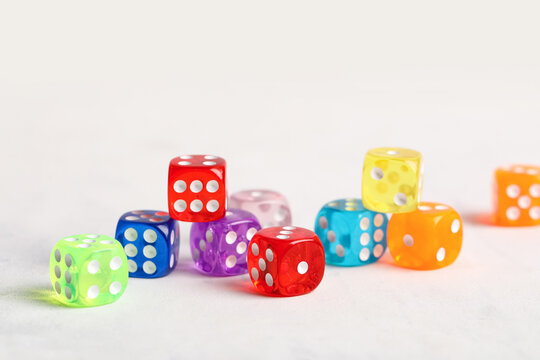 Colorful game dices on white background