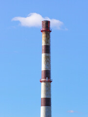 Boiler house chimney against a blue sky
