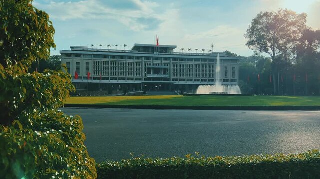 Ho Chi Minh City, Vietnam - September 18, 2025: View of the Independence or Reunification Palace, formerly Saigon. Dinh Choc Lop. A beautiful fountain sprays in front of the palace in bright daylight.