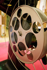Vintage film reel running on an old movie projector