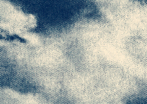 Blue halftone cloud texture macro printed dots background
