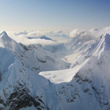 Breathtaking view of the snowy Rocky Mountains and valley on sunny day