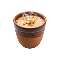 Masala chai with cardamom in clay cup