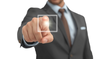 A businessman in a suit interacting with a virtual interface on a