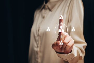 Recruitment concept. Businesswoman touching virtual human icon target, talent selection, hiring process, human resource management, career opportunity, workforce planning