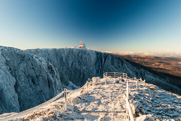 Frozen Mountain Path and Cliffs of Śnieżne Kotły in Winter