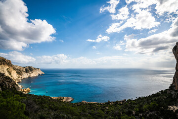 Breathtaking Coastal View of Ibiza, Spain with Clear Blue Waters