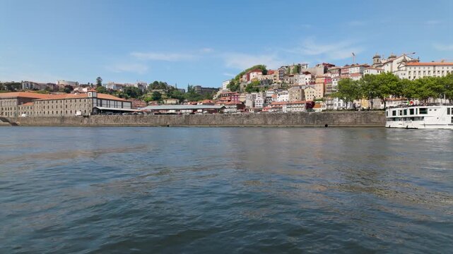 Panoramic view of Porto riverside and colorful buildings.